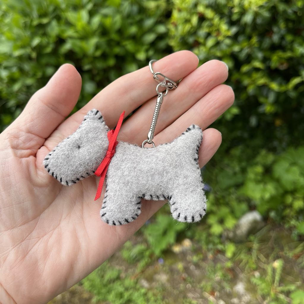 Amazing Craft Felt Dog Sewing Kit held in a hand