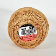 A DMC Cotton Perle 116 / 436 / 8 (Light Brown) ball of 100%, mercerised cotton thread that has been manufactured using a twisting process so it iis non-divisible.