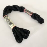 A DMC Cotton Perle in shade 310 (size 3) skein of 100%, mercerised cotton embroidery thread manufactured using a twisting process so it is non-divisible.