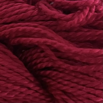 A DMC Cotton Perle in shade 498 (size 3) skein of 100%, mercerised cotton embroidery thread manufactured using a twisting process so it is non-divisible.