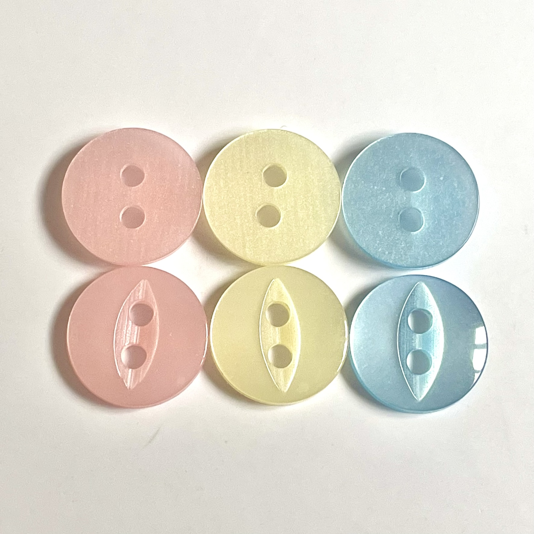 Pastel 12mm Fish eye buttons with pearl sheen in colours pastel pink, pastel yellow and pastel blue